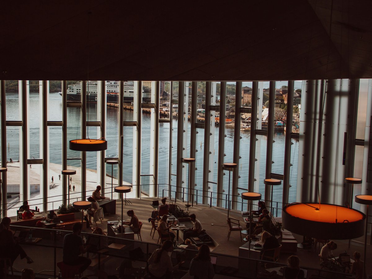 people sitting on chairs inside building
