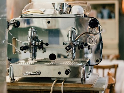 stainless steel and black machine