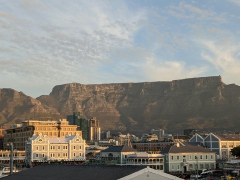 a city with a mountain in the background