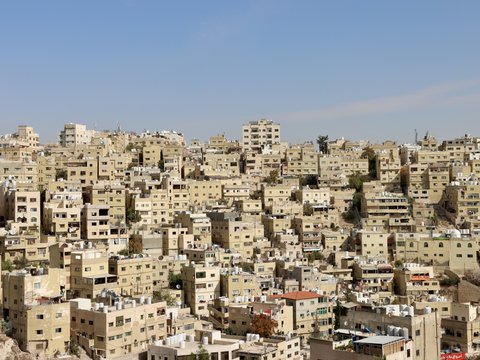 a view of a city with lots of tall buildings
