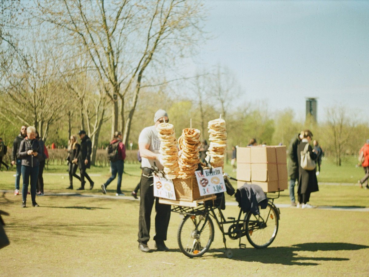 a group of people carrying boxes