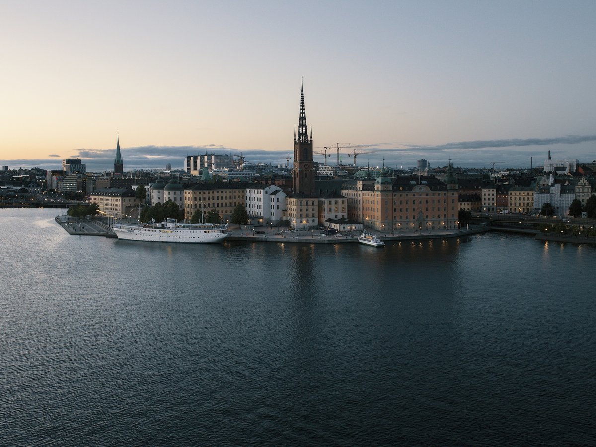 scenery of a body of water beside a city