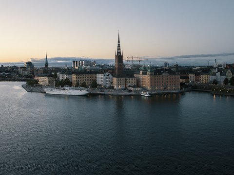 scenery of a body of water beside a city