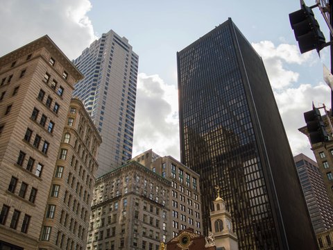 city with high-rise buildings under white skies