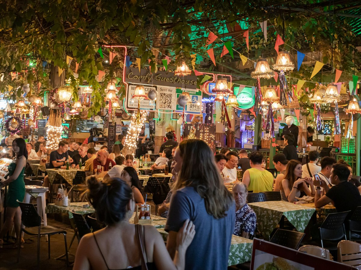 people sitting on chair in restaurant