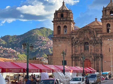 a street scene with a church in the background