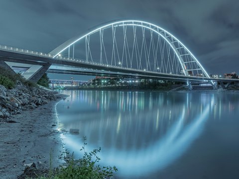 gray metal bridge over river
