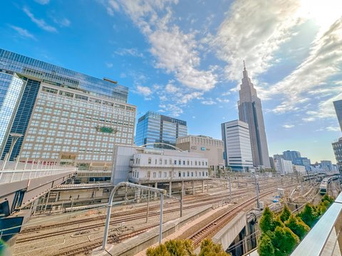 A panoramic view of a train track and buildings