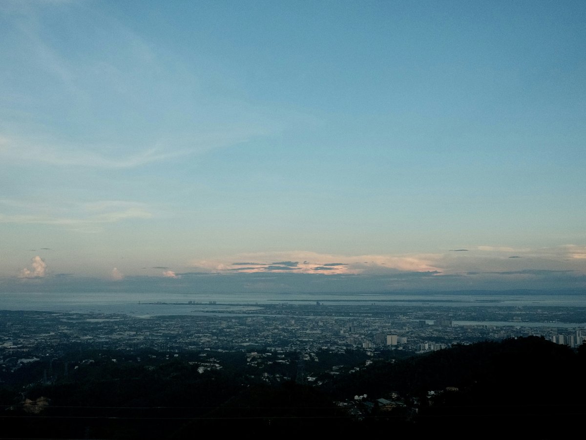 a view of a city and a body of water