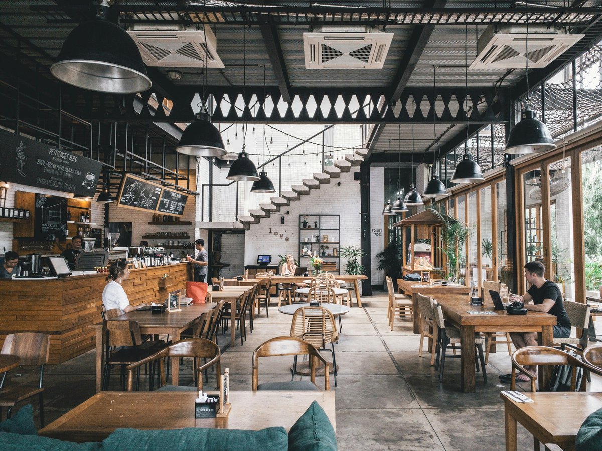 interior of rustic cafe with wooden tables