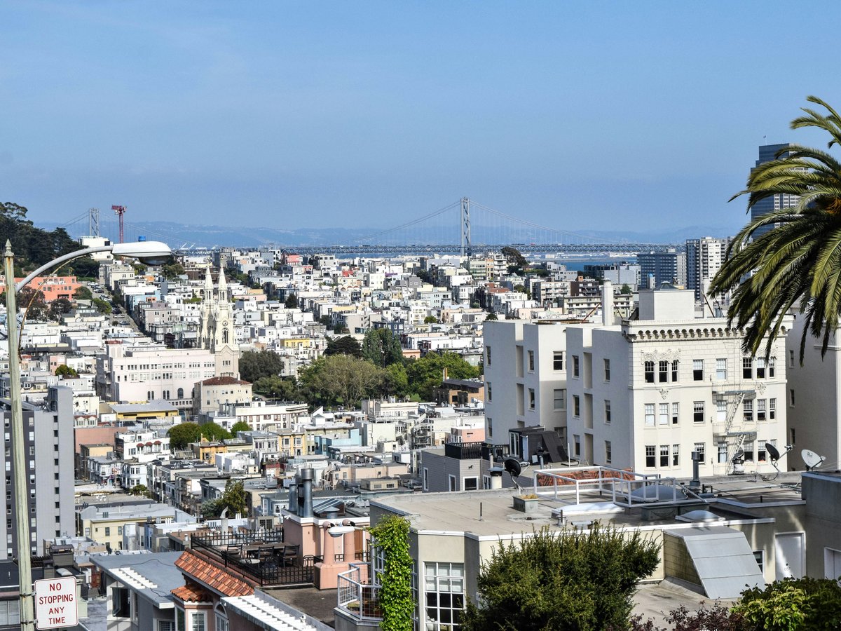 a view of a city from a hill