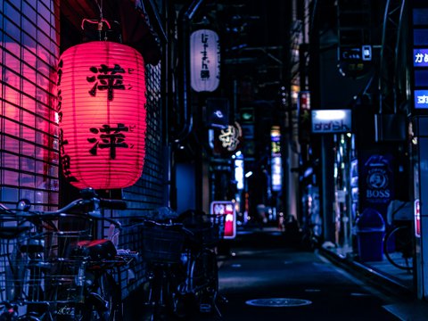 Japanese lantern over city bike at nighttime