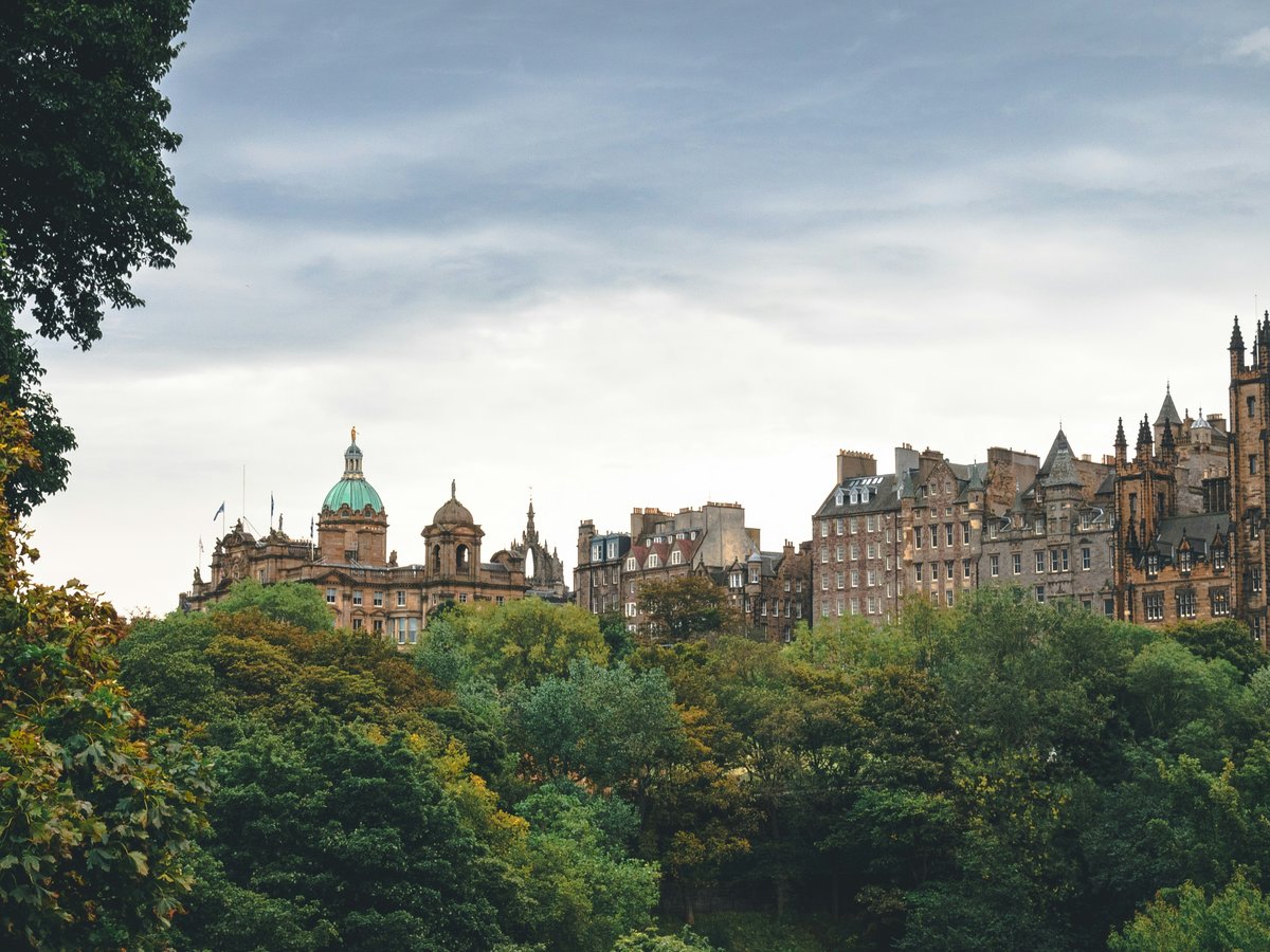 beige castle near trees during daytime