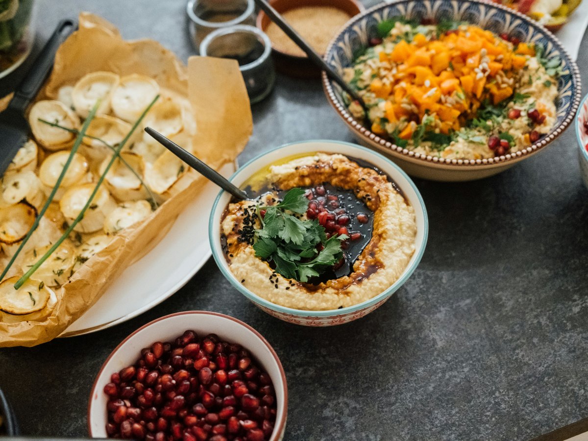 a table with bowls of food