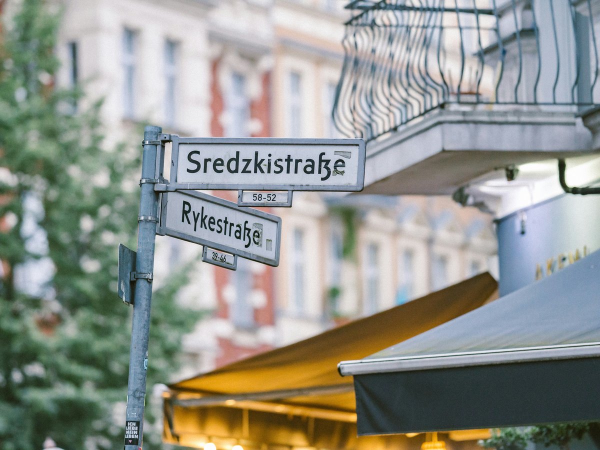 white and black street sign