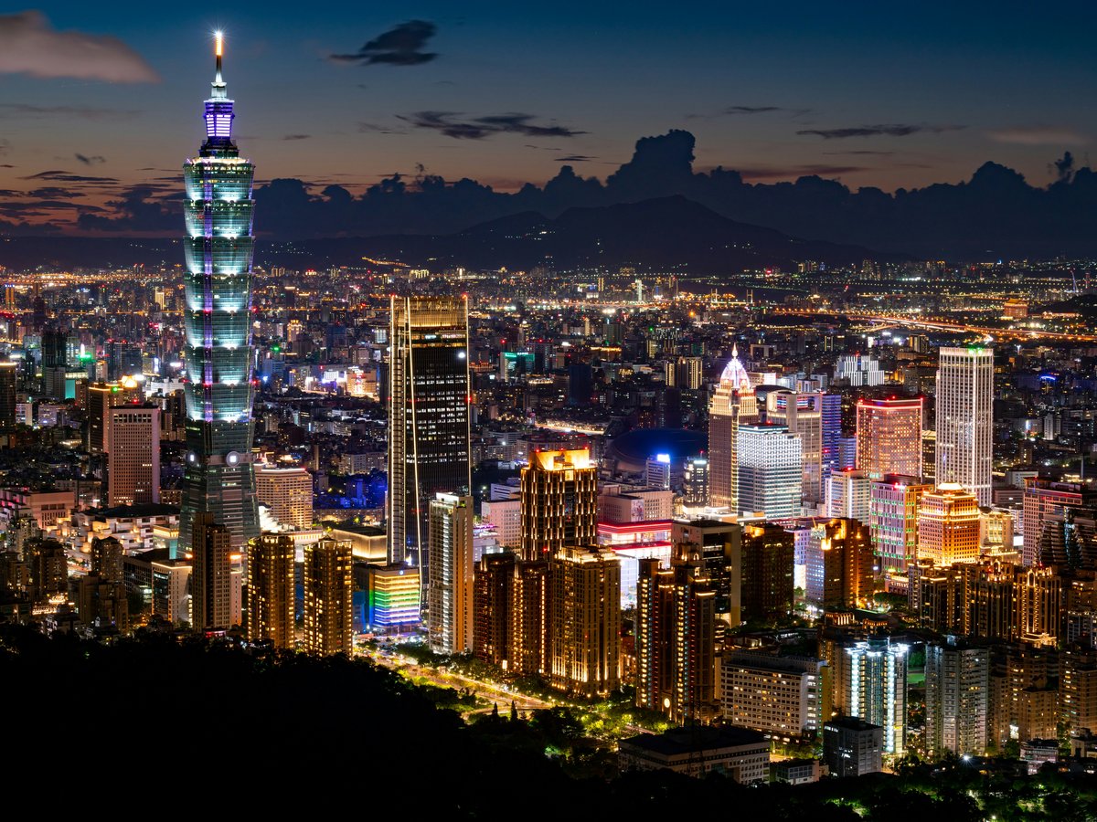 city skyline during night time