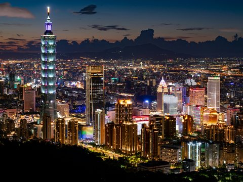 city skyline during night time