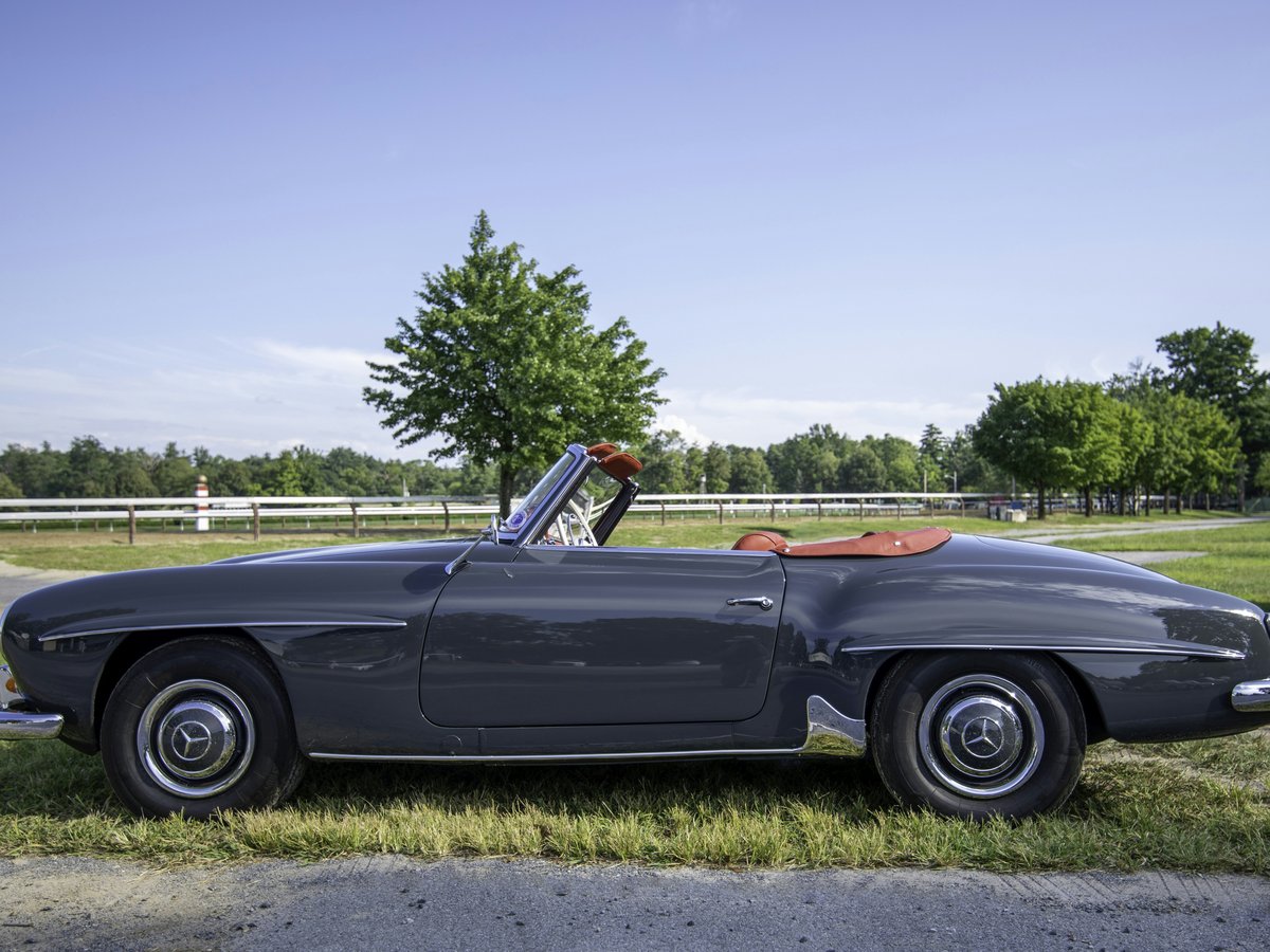 black convertible car on road during daytime