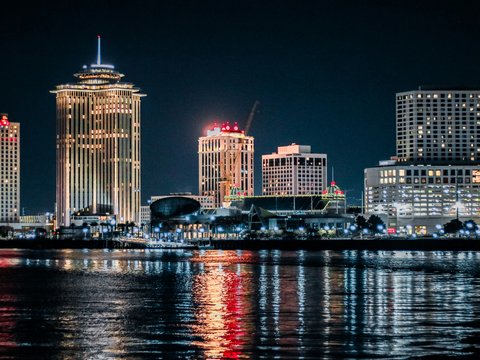 a view of a city at night from across the water
