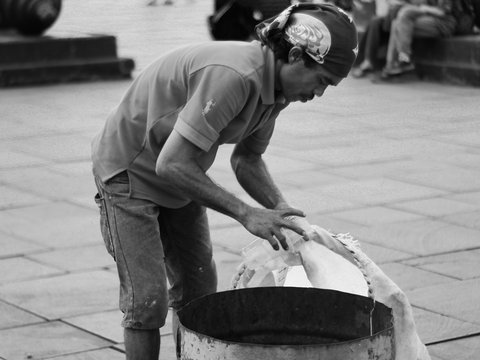 a man holding a bucket