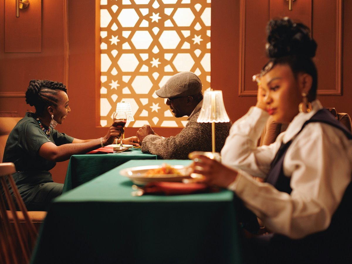 People are dining at a restaurant with elegant decor