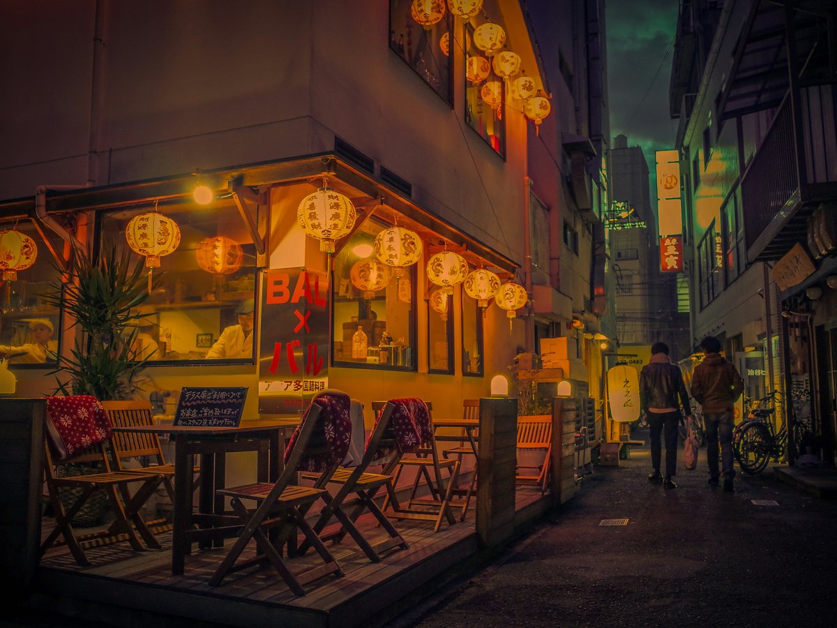 people walking on street during nighttime