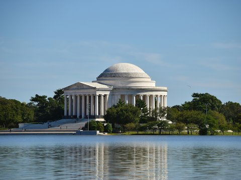 a view of the jefferson memorial from across the lake