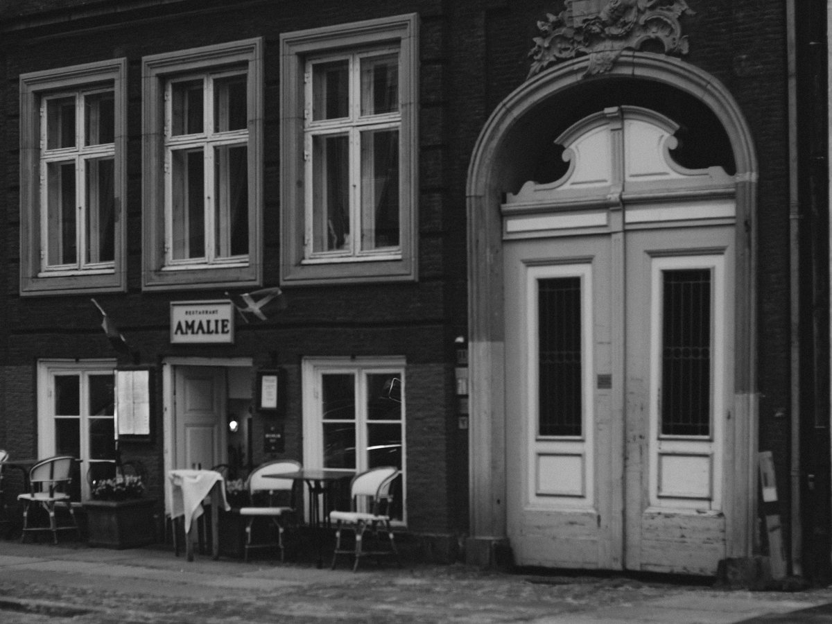 a black and white photo of an old building