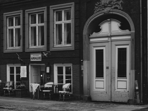 a black and white photo of an old building