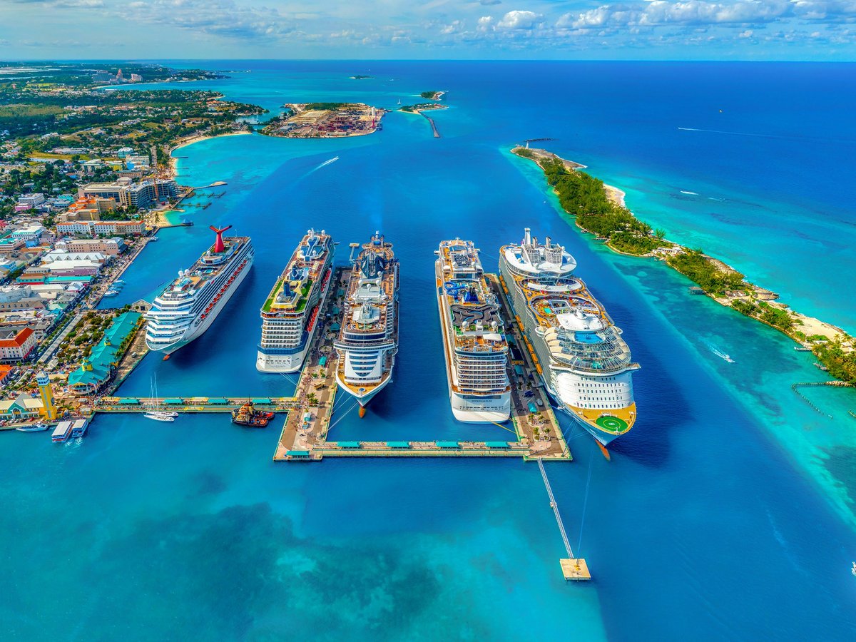 aerial photography of white and blue cruise ships during daytime