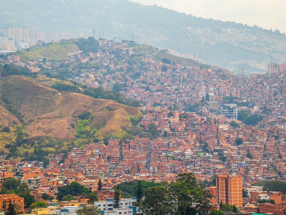 a view of a city with a mountain in the background