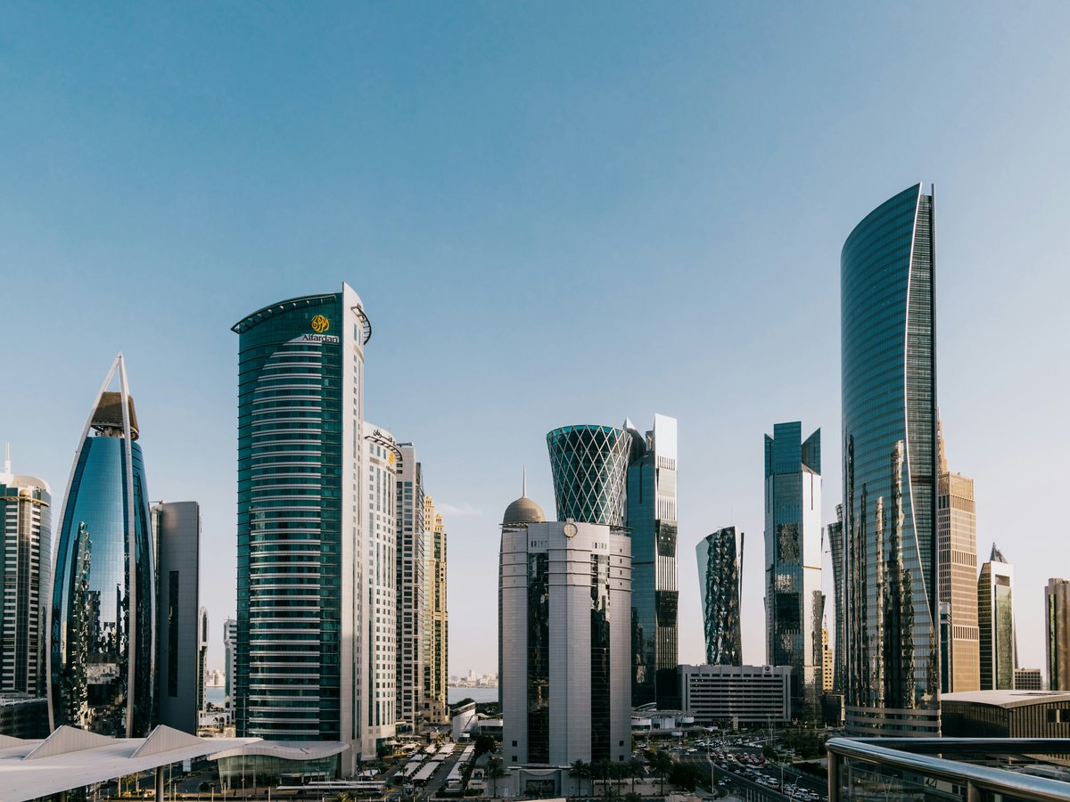 a group of tall buildings in a city