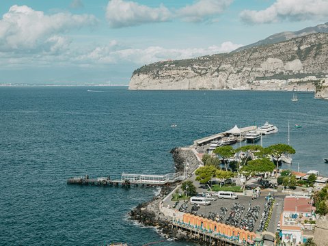 a view of a harbor with boats in the water