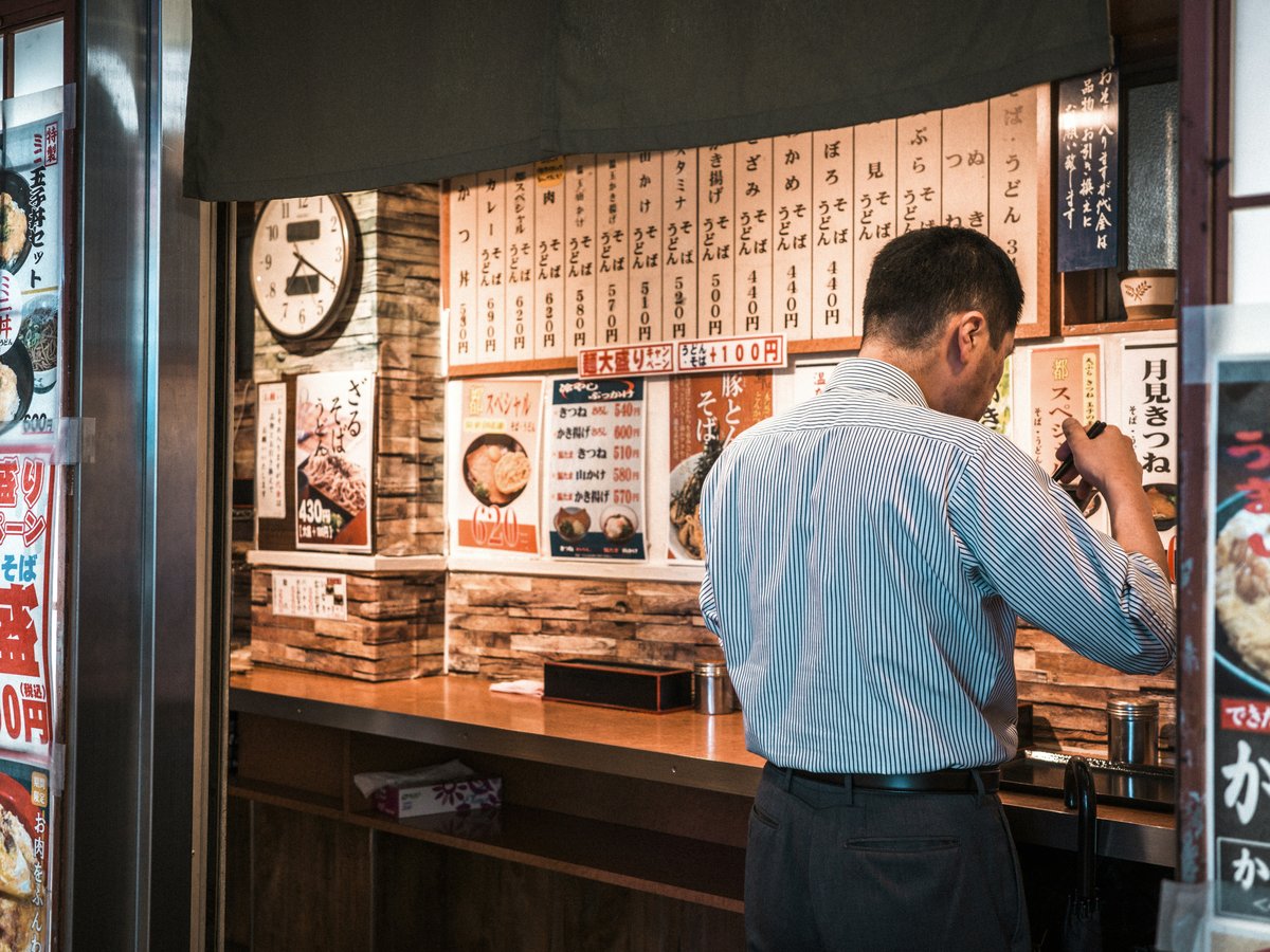 A man ordering food in a restaurant.