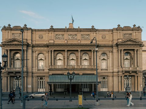 a large stone building with many windows