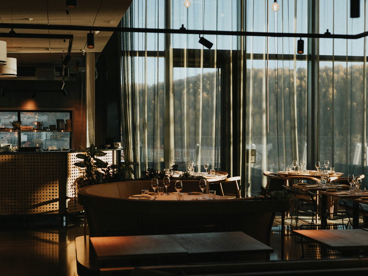 a room with tables and chairs
