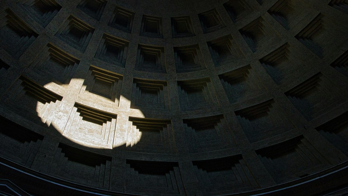A shaft of midday sun pours through the Pantheon's oculus and sweeps across the coffered dome, each square deepening in shadow as two thousand years of geometry catches the light