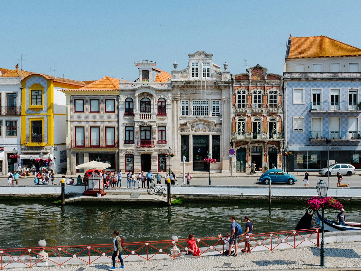 group of people beside water