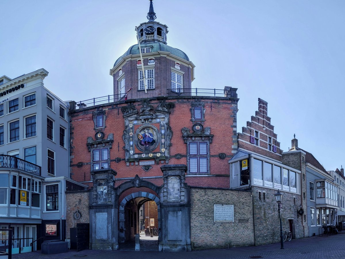 a building with a clock on the front of it