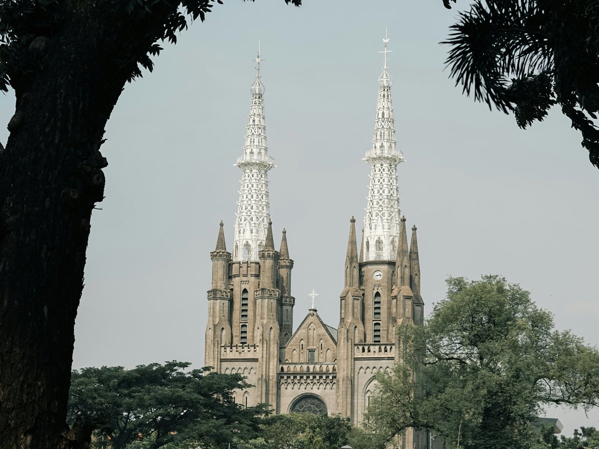 a large cathedral with two spires on top of it