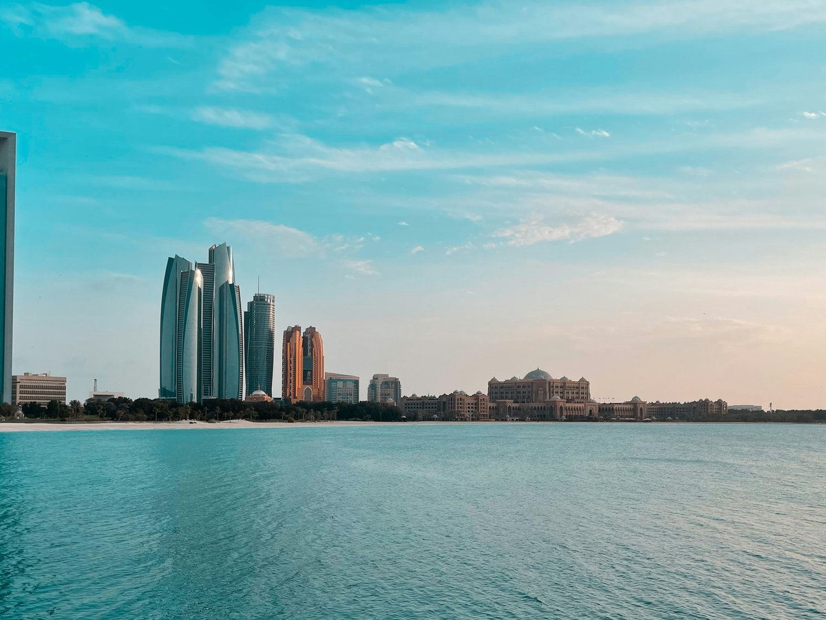 city skyline across body of water during daytime