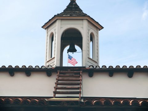 Bell tower displays the american flag