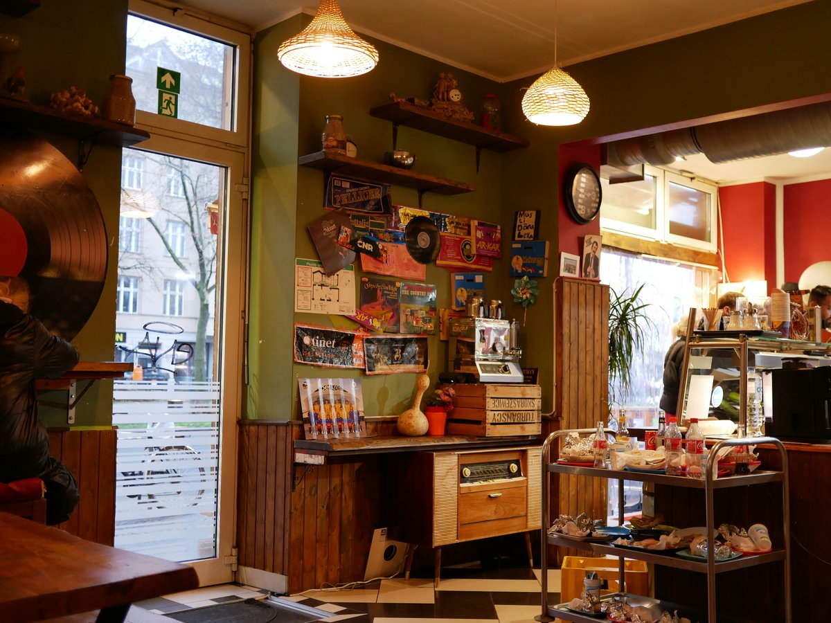 Cozy coffee shop interior with vintage decorations.