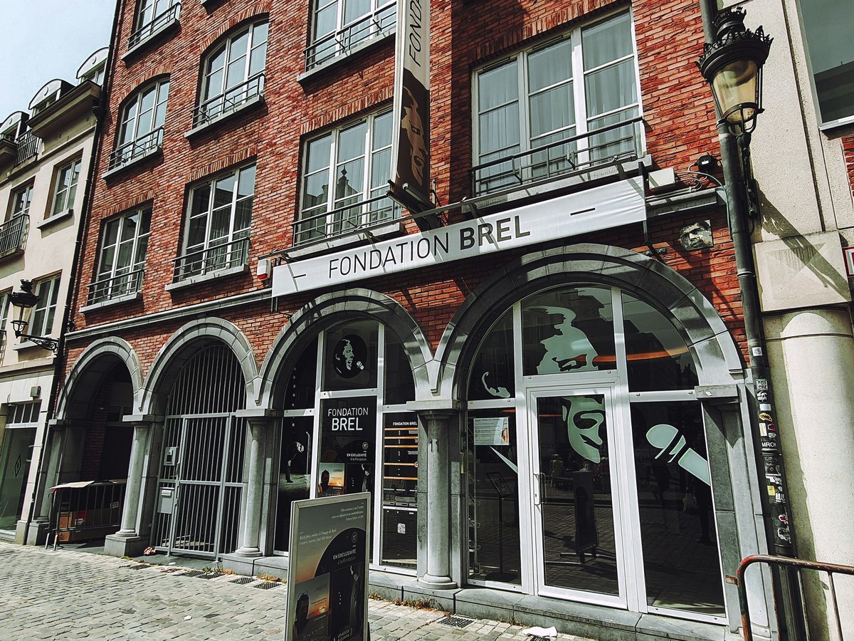 a red brick building with a sign that says poynnation brel