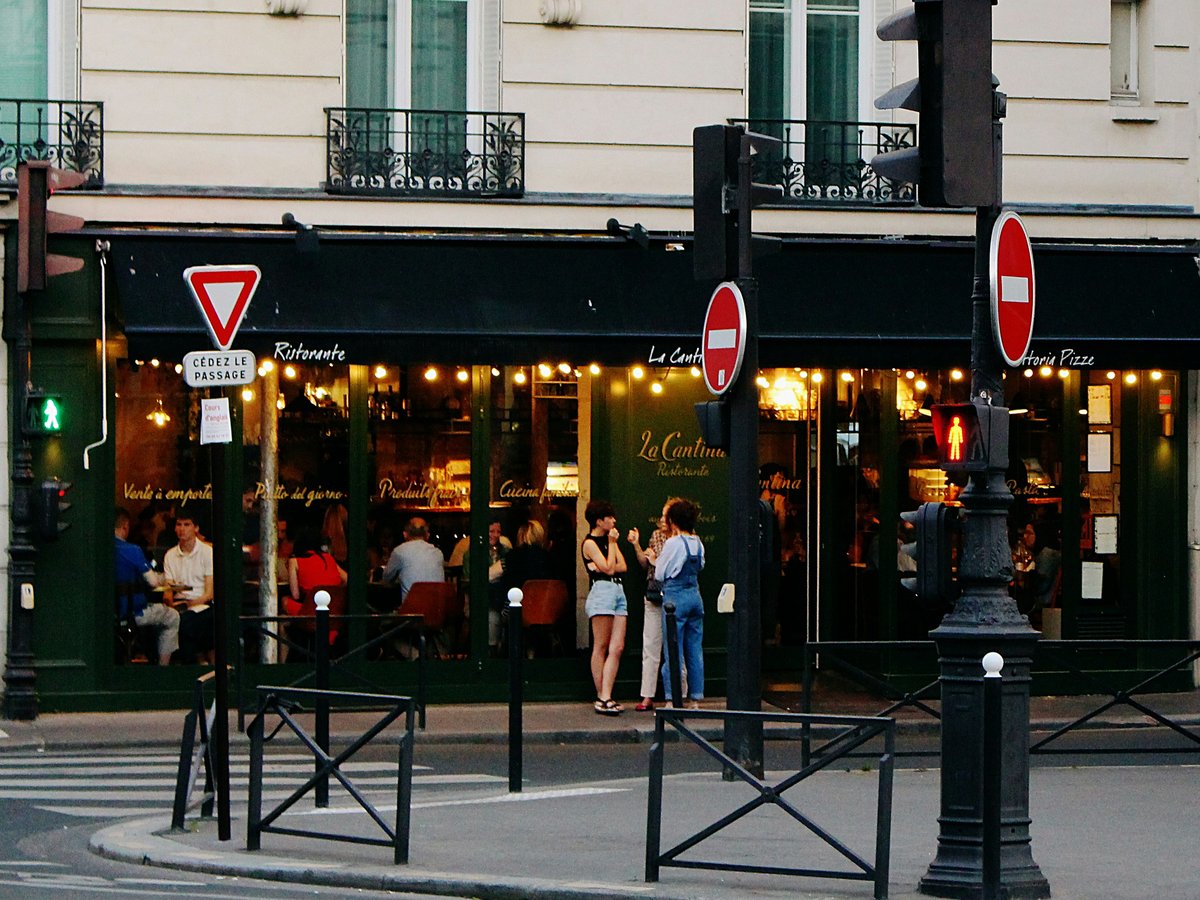 people standing near storefront