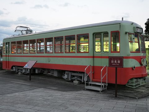 Vintage tram car with red and green stripes