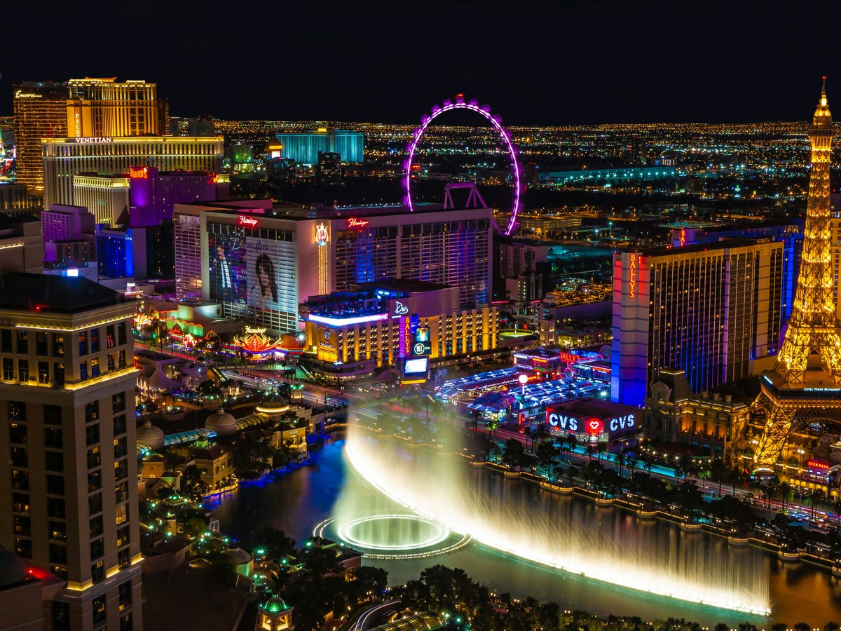 city with lights turned on during night time
