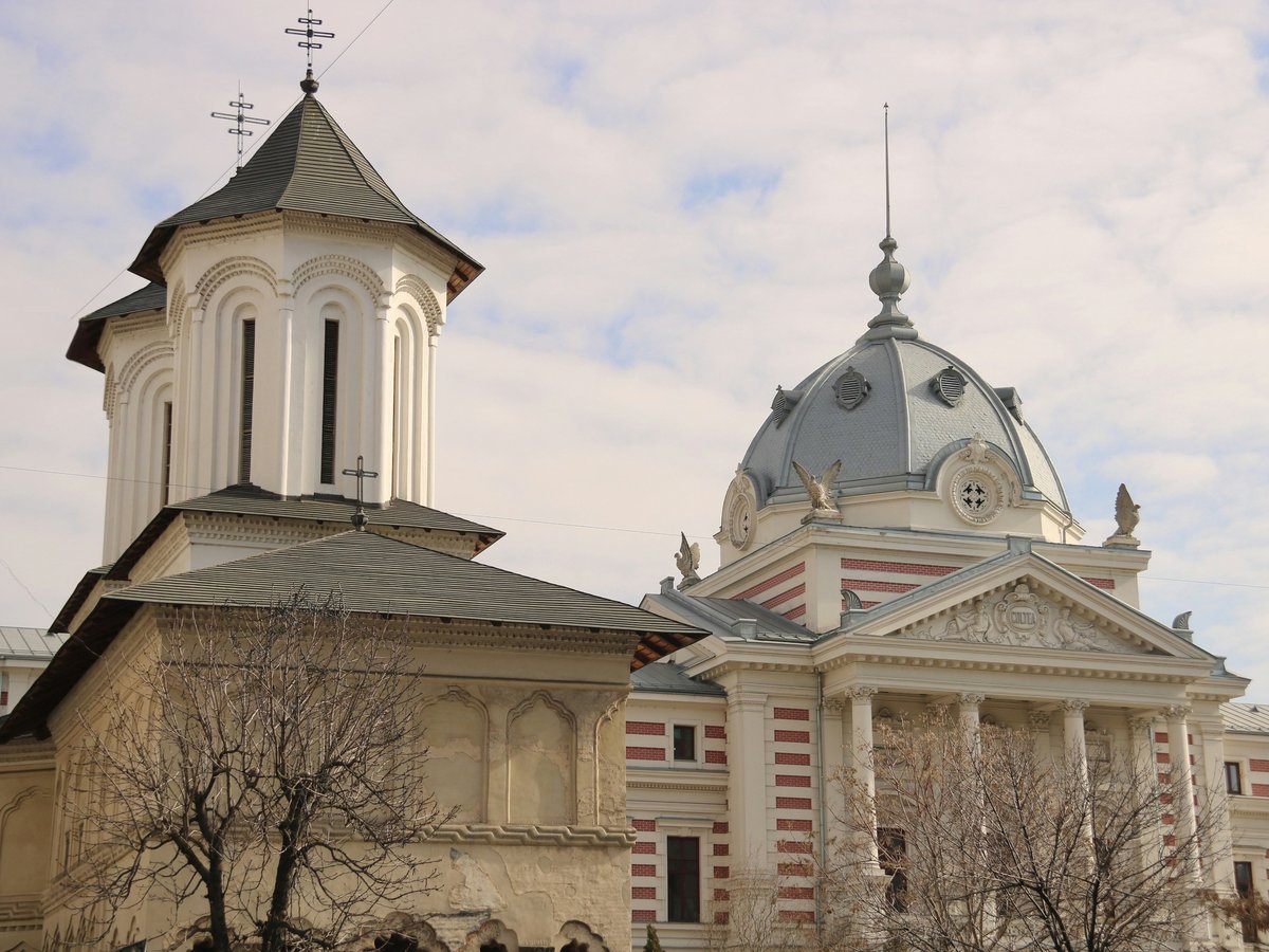 a large building with a clock on the top of it