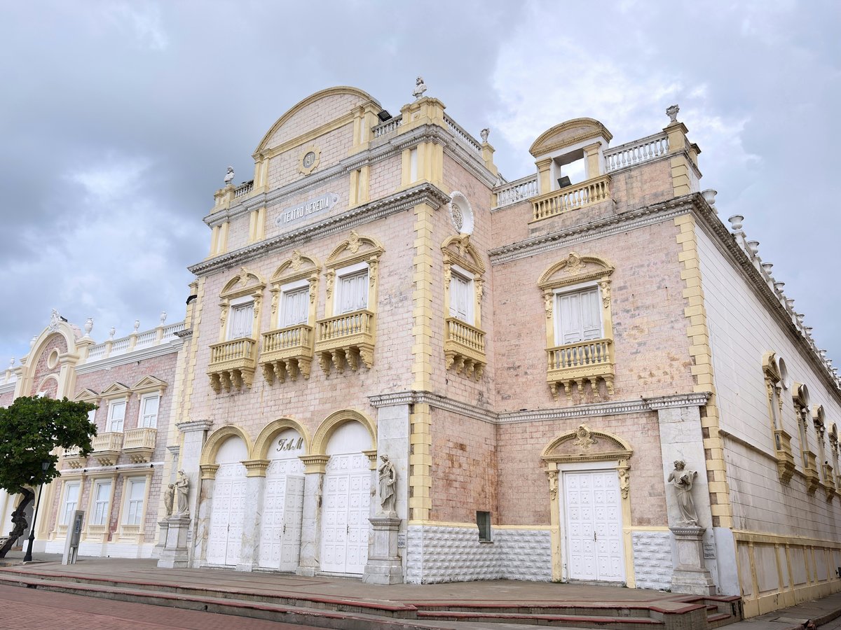 An ornate historic building with cream and yellow accents