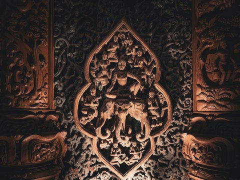 An intricately carved wall in a building
